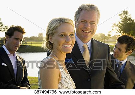 Stock Photograph - Four golfers in a golf course, Biltmore Golf Course, Coral Gables, Florida, USA. Fotosearch
