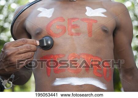 Gay man examining himself with a stethoscope, Washington DC, USA View Large Photo Image Stock Image - Gay man examining himself with a stethoscope, Washington DC, USA. Fotosearch