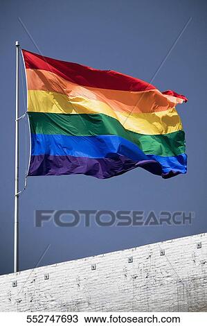Stock Image - Gay pride flag on a building, Castro District, San Francisco, California, USA. Fotosearch