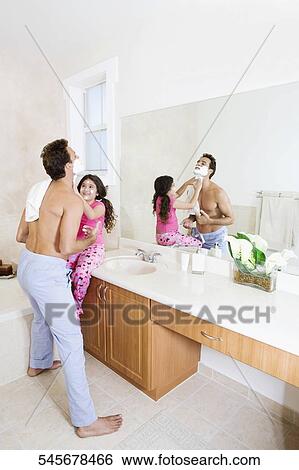 Girl applying shaving foam on her father's face View Large Photo Image Stock Photograph - Girl applying shaving foam on her father's face. Fotosearch