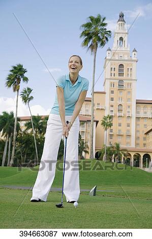 Golfer playing golf in a golf course and smiling, Biltmore Golf Course, Biltmore Hotel, Coral Gables, Florida, USA View Large Photo Image Stock Photo - Golfer playing golf in a golf course and smiling, Biltmore Golf Course, Biltmore Hotel, Coral Gables, Florida, USA. Fotosearch