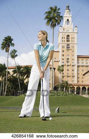 Golfer playing golf in a golf course, Biltmore Golf Course, Biltmore Hotel, Coral Gables, Florida, USA View Large Photo Image Stock Photo - Golfer playing golf in a golf course, Biltmore Golf Course, Biltmore Hotel, Coral Gables, Florida, USA. Fotosearch