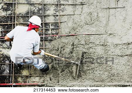 High angle view of a construction worker working at a construction site View Large Photo Image Stock Image - High angle view of a construction worker working at a construction site. Fotosearch