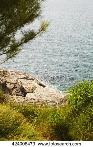 Stock Photo - High angle view of the coast. Fotosearch