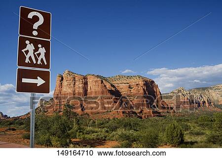 Hiking trail road sign in a field with rock formations in the background, Sedona, Arizona, USA View Large Photo Image Stock Image - Hiking trail road sign in a field with rock formations in the background, Sedona, Arizona, USA. Fotosearch
