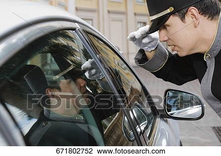 Hotel porter adjusting his cap, Biltmore Hotel, Coral Gables, Florida, USA View Large Photo Image Stock Image - Hotel porter adjusting his cap, Biltmore Hotel, Coral Gables, Florida, USA. Fotosearch