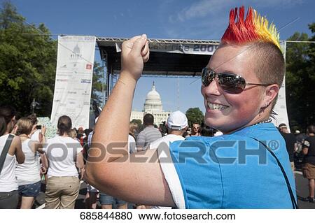 Lesbian woman smiling in a gay pride parade, Washington DC, USA View Large Photo Image Stock Image - Lesbian woman smiling in a gay pride parade, Washington DC, USA. Fotosearch
