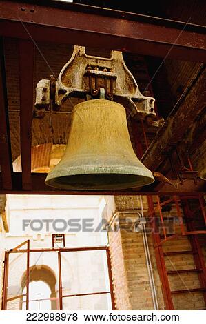 Low angle view of a bell hanging from an iron bar, Toledo, Spain View Large Photo Image Stock Photo - Low angle view of a bell hanging from an iron bar, Toledo, Spain. Fotosearch