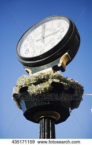 Low angle view of a clock, New York City, New York State, USA View Large Photo Image Stock Photo - Low angle view of a clock, New York City, New York State, USA. Fotosearch