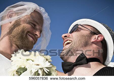 Low angle view of a newlywed gay couple, DuPont Circle, Washington DC, USA View Large Photo Image Stock Photograph - Low angle view of a newlywed gay couple, DuPont Circle, Washington DC, USA. Fotosearch