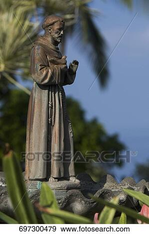 Low angle view of a statue of St. Francis Regis, St. Benedict Catholic Church, Honaunau, Kona, Hawaii, USA View Large Photo Image Stock Photo - Low angle view of a statue of St. Francis Regis, St. Benedict Catholic Church, Honaunau, Kona, Hawaii, USA. Fotosearch