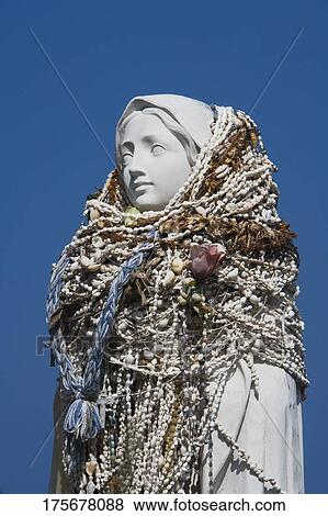 Low angle view of a statue of Virgin Mary, St. Benedict Catholic Church, Honaunau, Kona, Hawaii, USA View Large Photo Image Stock Photo - Low angle view of a statue of Virgin Mary, St. Benedict Catholic Church, Honaunau, Kona, Hawaii, USA. Fotosearch