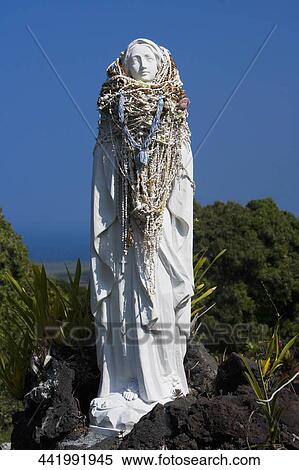 Stock Photography - Low angle view of a statue of Virgin Mary, St. Benedict Catholic Church, Honaunau, Kona, Hawaii, USA. Fotosearch