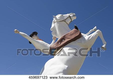 Stock Image - Low angle view of an equestrian's statue, Kanab, Utah, USA. Fotosearch
