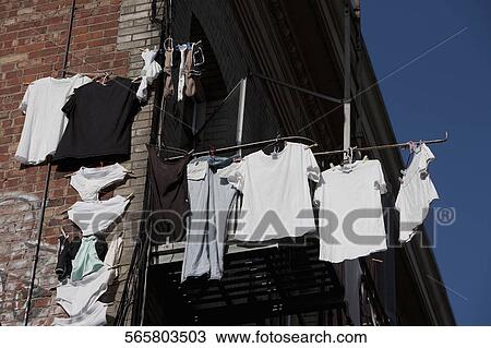 Low angle view of clothes drying on a house, San Francisco, California, USA View Large Photo Image Stock Image - Low angle view of clothes drying on a house, San Francisco, California, USA. Fotosearch