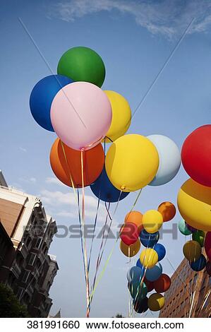 Low angle view of colorful balloons in a gay pride parade, DuPont Circle, Washington DC, USA View Large Photo Image Stock Image - Low angle view of colorful balloons in a gay pride parade, DuPont Circle, Washington DC, USA. Fotosearch