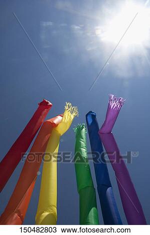 Low angle view of rainbow colored air dancers, Washington DC, USA View Large Photo Image Stock Image - Low angle view of rainbow colored air dancers, Washington DC, USA. Fotosearch