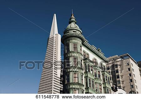 Low angle view of skyscrapers in a city, Columbus Tower, Transamerica Pyramid, San Francisco, California, USA View Large Photo Image Stock Photo - Low angle view of skyscrapers in a city, Columbus Tower, Transamerica Pyramid, San Francisco, California, USA. Fotosearch