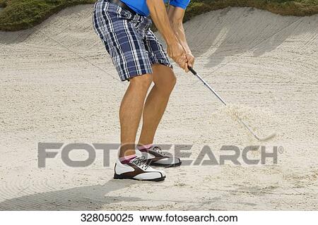 Low section view of a man playing golf, Biltmore Golf Course, Coral Gables, Florida, USA View Large Photo Image Stock Photography - Low section view of a man playing golf, Biltmore Golf Course, Coral Gables, Florida, USA. Fotosearch