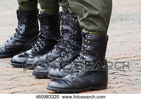 Low section view of three policemen standing in a row View Large Photo Image Stock Image - Low section view of three policemen standing in a row. Fotosearch
