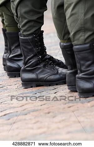 Low section view of three security guards standing View Large Photo Image Stock Image - Low section view of three security guards standing. Fotosearch