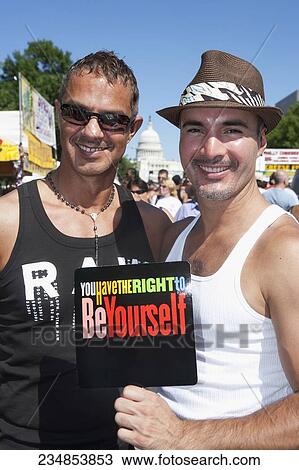 Male homosexual couple standing together and smiling, State Capitol Building, Washington DC, USA View Large Photo Image Stock Image - Male homosexual couple standing together and smiling, State Capitol Building, Washington DC, USA. Fotosearch