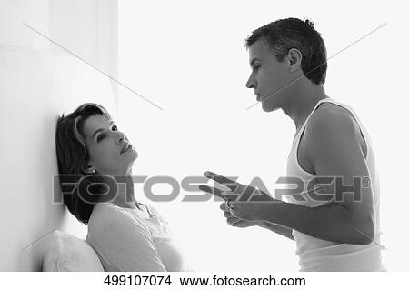 Man consoling a woman View Large Photo Image Picture - Man consoling a woman. Fotosearch