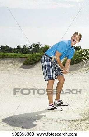 Man playing golf in a golf course, Biltmore Golf Course, Coral Gables, Florida, USA View Large Photo Image Stock Image - Man playing golf in a golf course, Biltmore Golf Course, Coral Gables, Florida, USA. Fotosearch