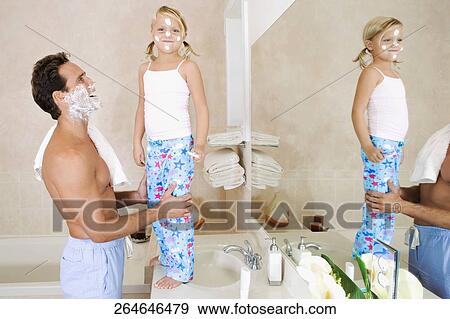 Man playing with his daughter in the bathroom View Large Photo Image Stock Photo - Man playing with his daughter in the bathroom. Fotosearch