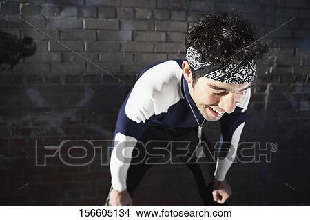 Man resting after exercise View Large Photo Image Picture - Man resting after exercise. Fotosearch
