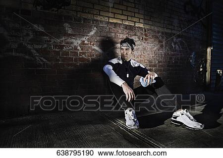 Man resting after exercise View Large Photo Image Stock Image - Man resting after exercise. Fotosearch