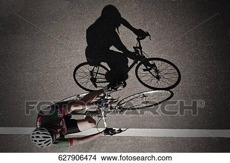Picture - Man riding a bicycle on the road, Hudson River, New York City, New York State, USA. Fotosearch
