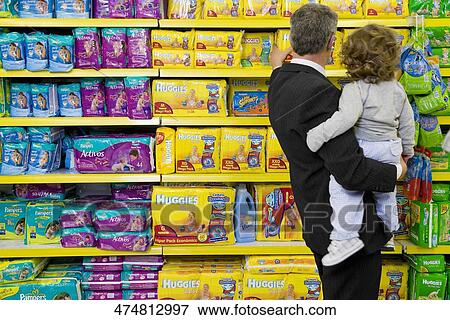 Man shopping with his grandson in a supermarket View Large Photo Image Stock Photo - Man shopping with his grandson in a supermarket. Fotosearch