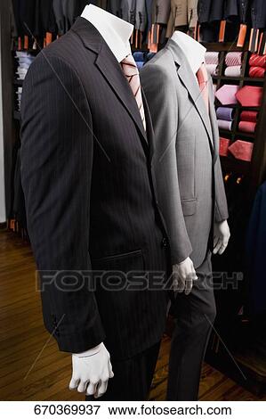Mannequins dressed in formalwear in a clothing store View Large Photo Image Stock Photo - Mannequins dressed in formalwear in a clothing store. Fotosearch