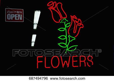Stock Photograph - Neon sign at a flower market, 28 Street, New York City, New York State, USA. Fotosearch
