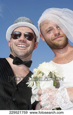 Newlywed homosexual couple smiling, Washington DC, USA View Large Photo Image Stock Photo - Newlywed homosexual couple smiling, Washington DC, USA. Fotosearch