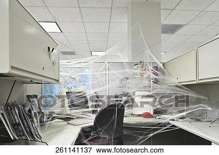 Stock Photo - Office interiors covered with cobwebs. Fotosearch