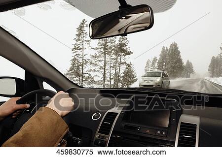 Person driving a car, Old Trail Town, Cody, Wyoming, USA View Large Photo Image Stock Photography - Person driving a car, Old Trail Town, Cody, Wyoming, USA. Fotosearch