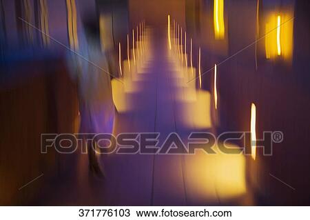 Person running in a corridor, Santa Fe, New Mexico, USA View Large Photo Image Stock Image - Person running in a corridor, Santa Fe, New Mexico, USA. Fotosearch