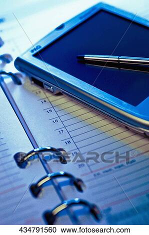 Stock Image - Personal data assistant on an personal organizer. Fotosearch