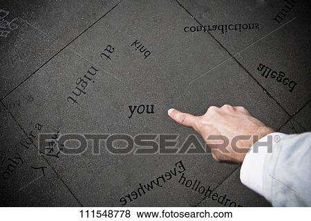 Person's hand pointing towards text on the floor, North Beach, San Francisco, California, USA View Large Photo Image Stock Photo - Person's hand pointing towards text on the floor, North Beach, San Francisco, California, USA. Fotosearch