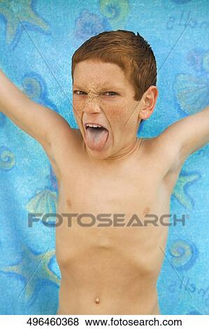 Portrait of a boy sticking his tongue out View Large Photo Image Stock Photo - Portrait of a boy sticking his tongue out. Fotosearch