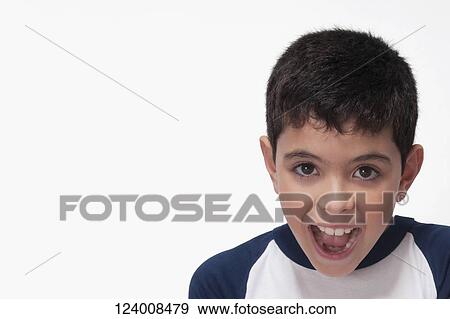 Portrait of a boy with his mouth open View Large Photo Image Stock Photo - Portrait of a boy with his mouth open. Fotosearch