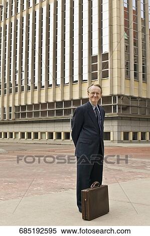 Stock Photography - Portrait of a businessman smiling. Fotosearch