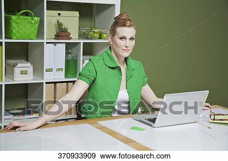 Portrait of a businesswoman in the office View Large Photo Image Stock Photo - Portrait of a businesswoman in the office. Fotosearch