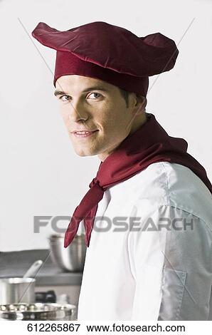 Portrait of a chef smiling View Large Photo Image Stock Photo - Portrait of a chef smiling. Fotosearch