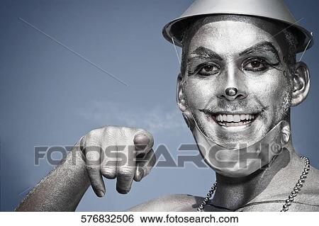 Stock Photograph - Portrait of a gay man pointing forward, Washington DC, USA. Fotosearch