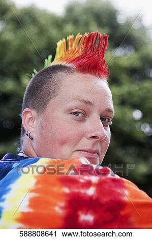 Stock Image - Portrait of a lesbian woman smiling, DuPont Circle, Washington DC, USA. Fotosearch