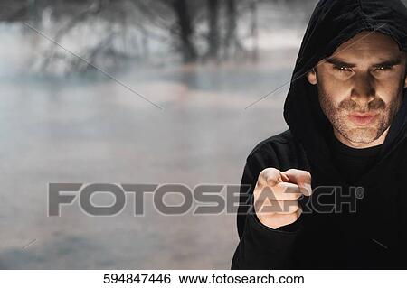 Portrait of a man pointing with his finger, Mammoth Hot Springs, Yellowstone National Park, Wyoming, USA View Large Photo Image Stock Photograph - Portrait of a man pointing with his finger, Mammoth Hot Springs, Yellowstone National Park, Wyoming, USA. Fotosearch