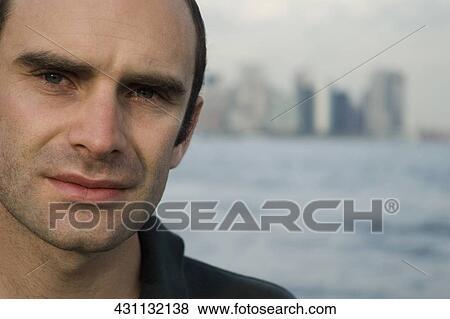 Portrait of a mid adult man View Large Photo Image Stock Photo - Portrait of a mid adult man. Fotosearch
